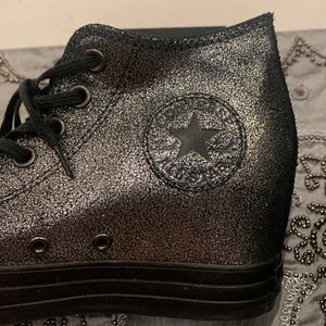 Converse women’s wedge sneakers in a metallic pewter and black finish